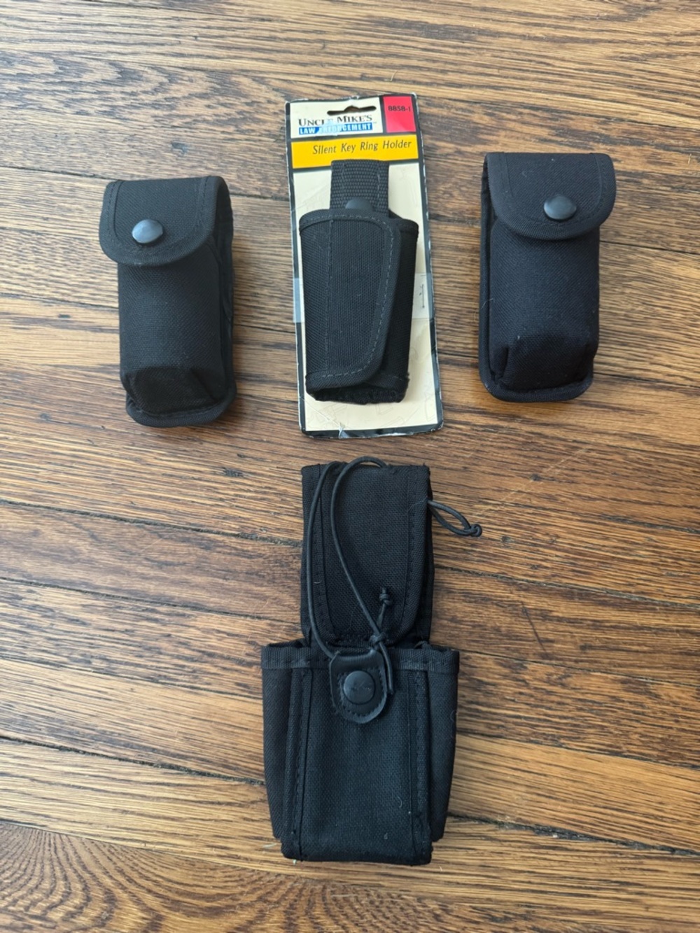 2 Pepper spray holders, 1 tactical key holder, 1 tactical radio holder.